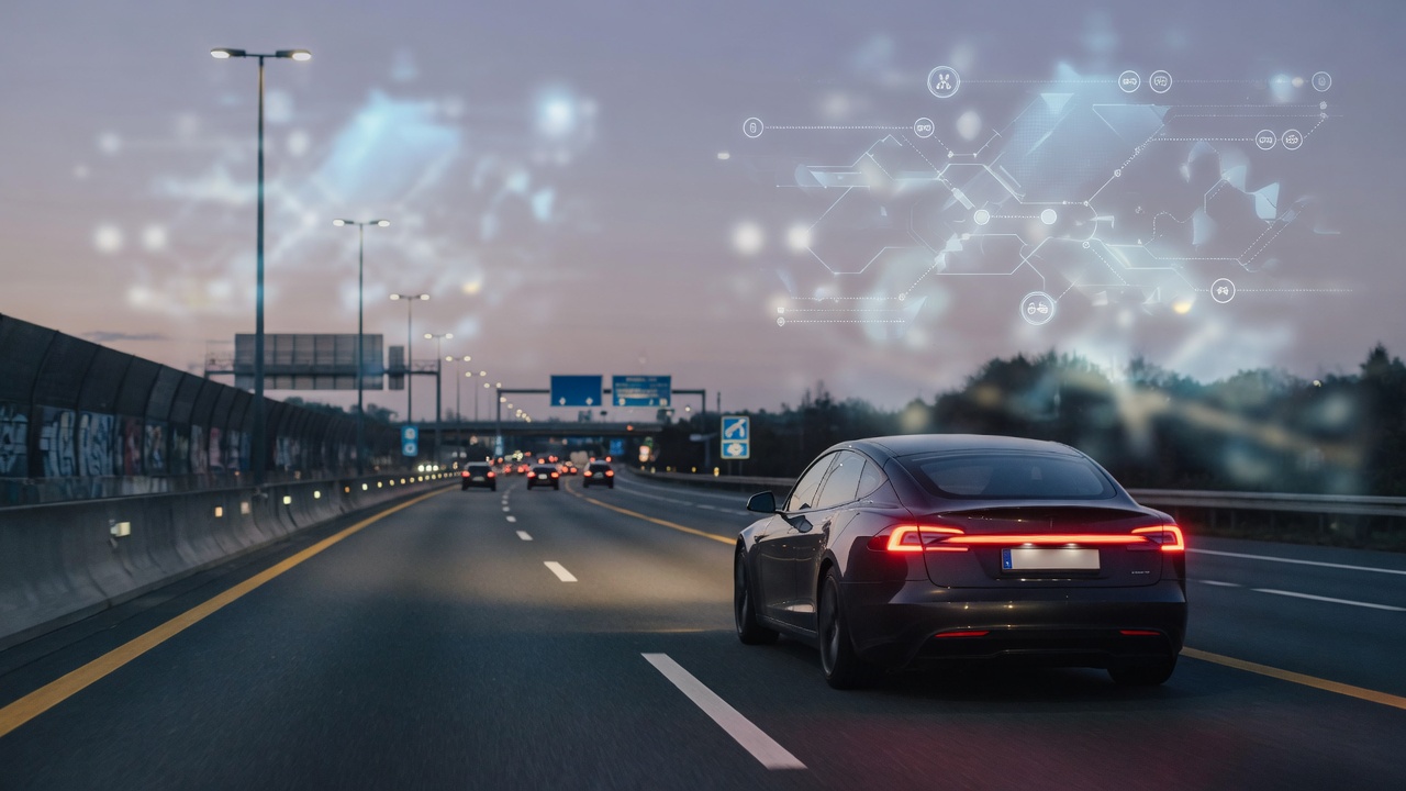 Tesla on a European highway at dusk, illustrating FSD regulation and type approval